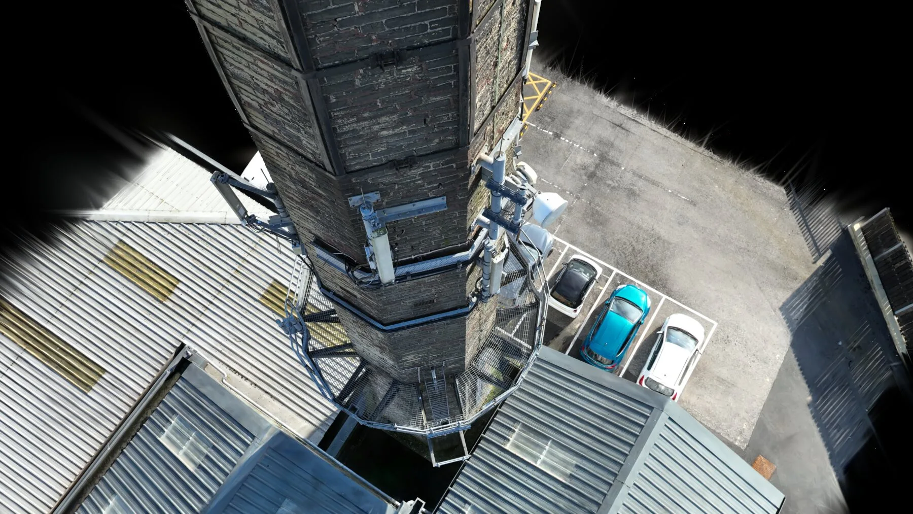 Drone capture of a historic mill tower and rooftops